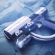 A futuristic gun lays on an icy-looking landscape.